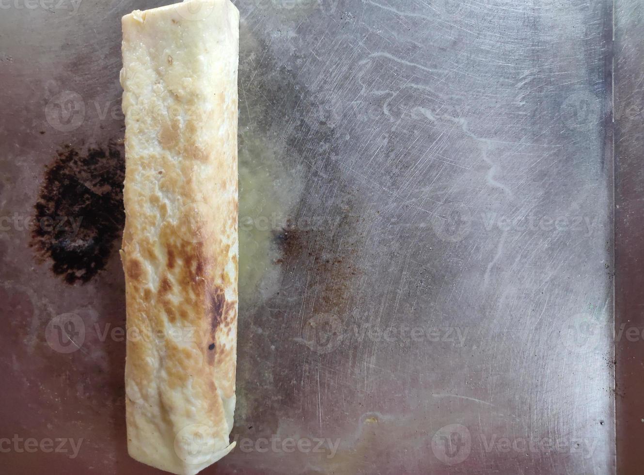 processi foto di kebab essere fritte nel un' frittura padella
