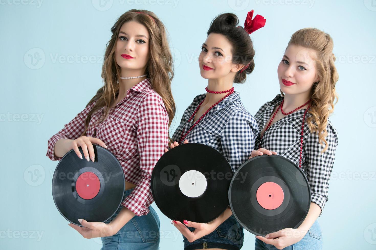 retrò donne posa con musicale vinile record foto