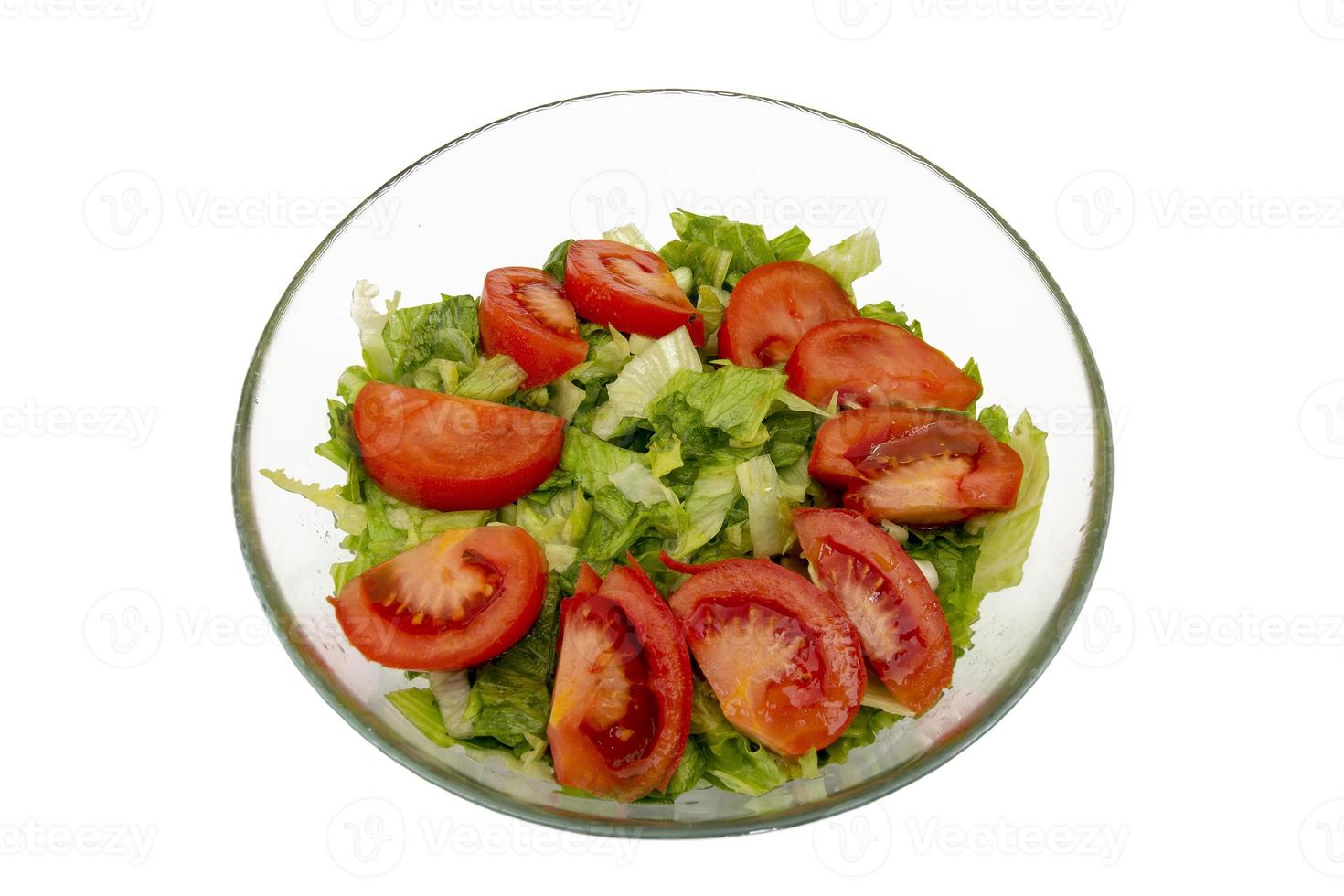 insalata di affettato pomodori e lattuga nel un' bicchiere ciotola foto