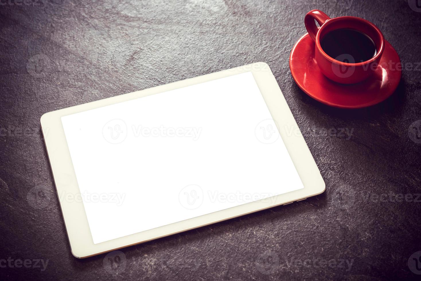 tablet e caffè foto