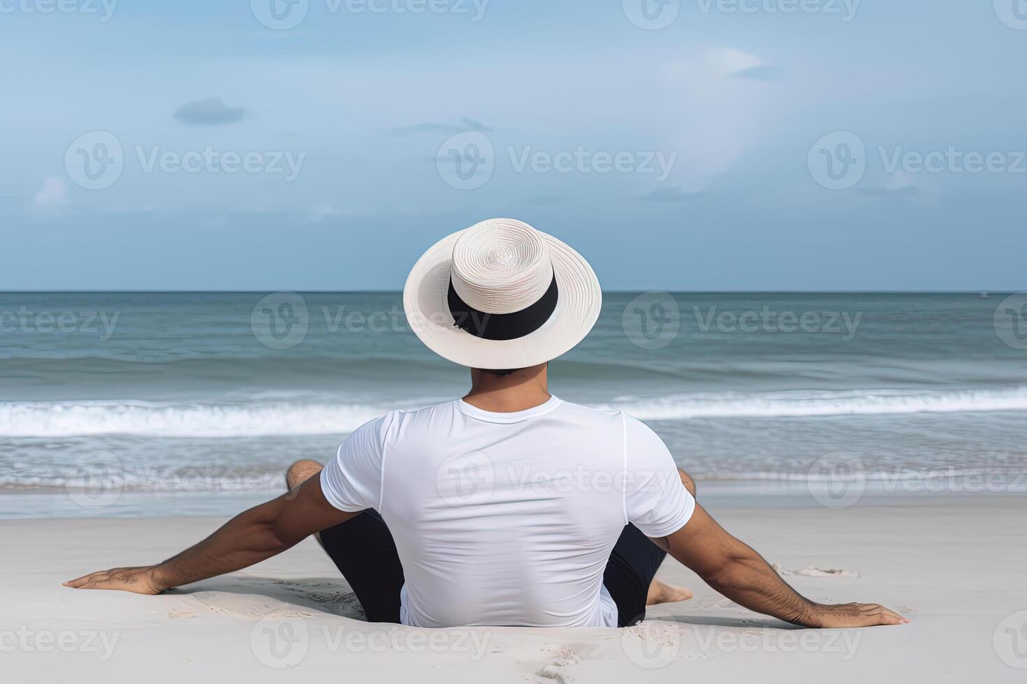 indietro Visualizza di un' uomo indossare un' cappello seduta su un' spiaggia. ai generato foto