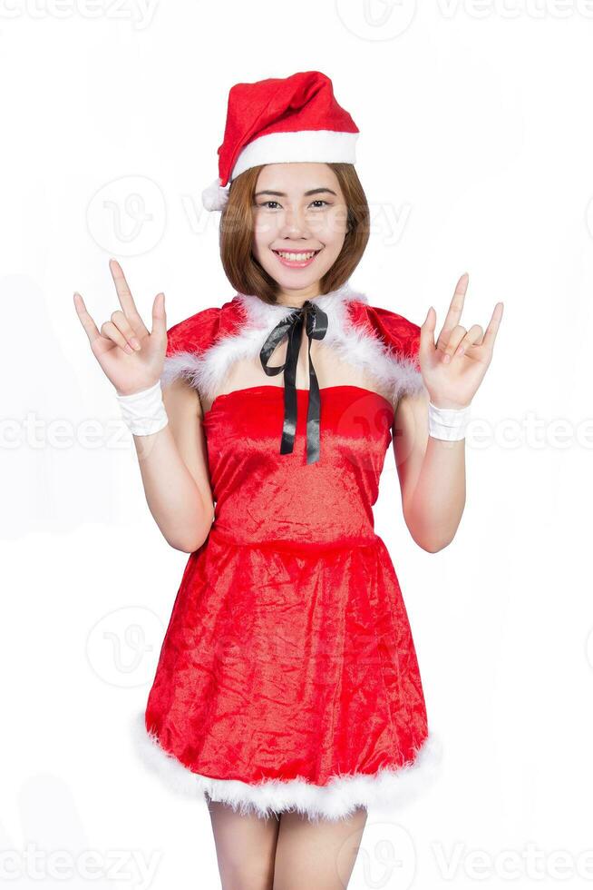 bella asiatico ragazza nel Santa costume per Natale su bianca sfondo foto