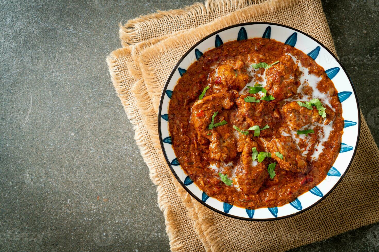 pollo tikka masala cibo piccante a base di carne al curry foto