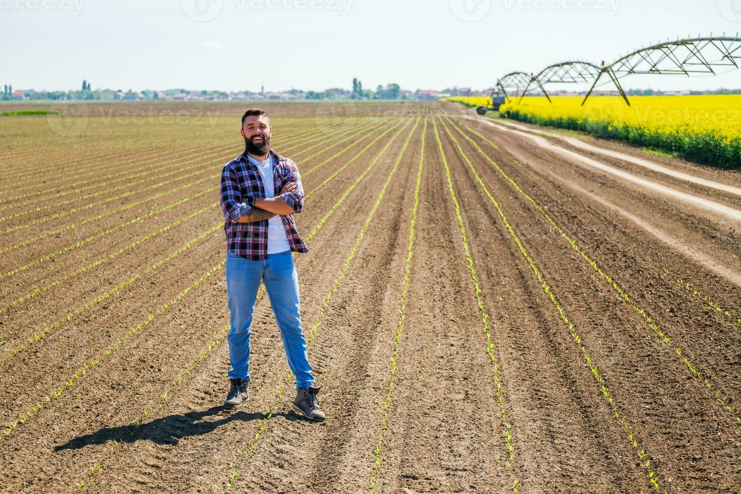 un' contadino controllo il Ritaglia foto