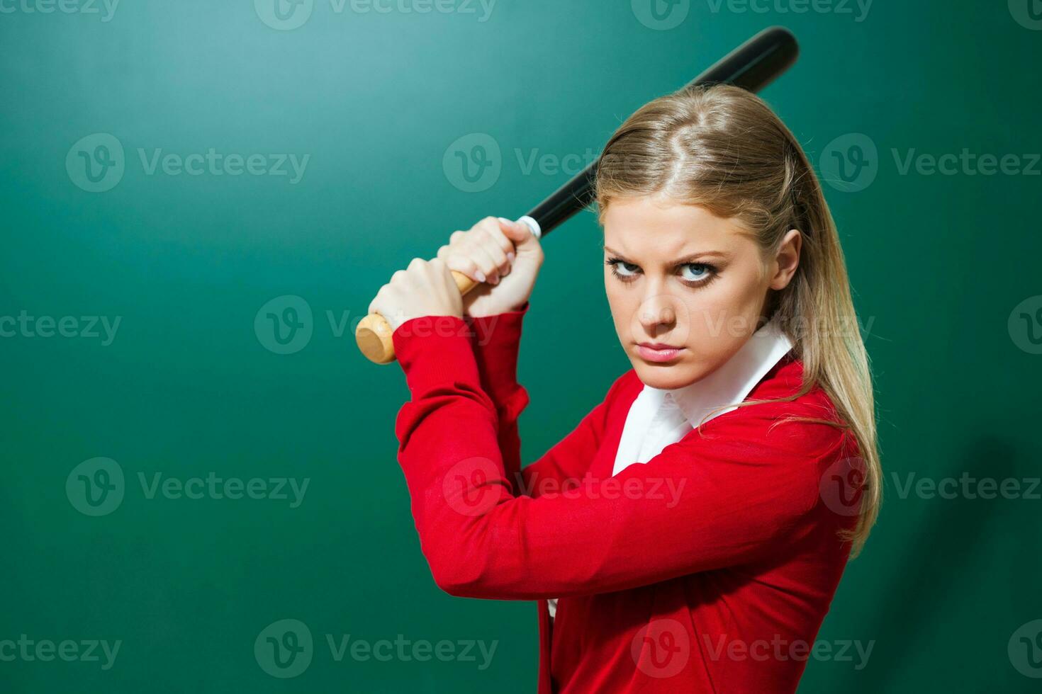 bionda donna con un' baseball pipistrello foto