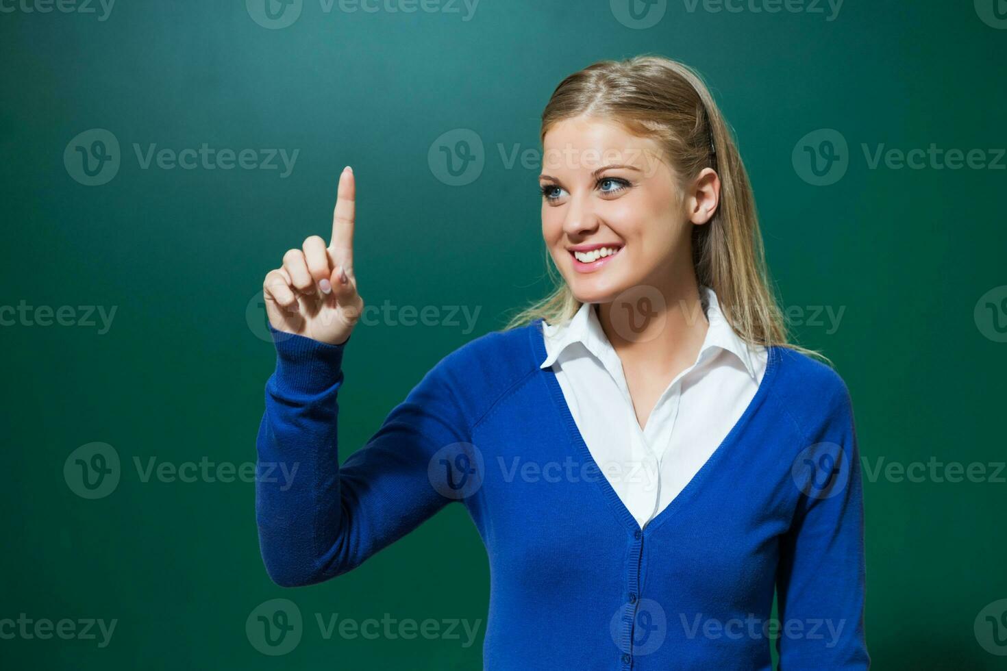 un' Università alunno ragazza con un' blu cardigan foto