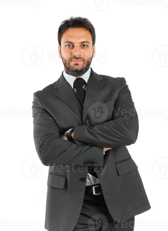 giovane uomo d'affari con braccia attraversato foto