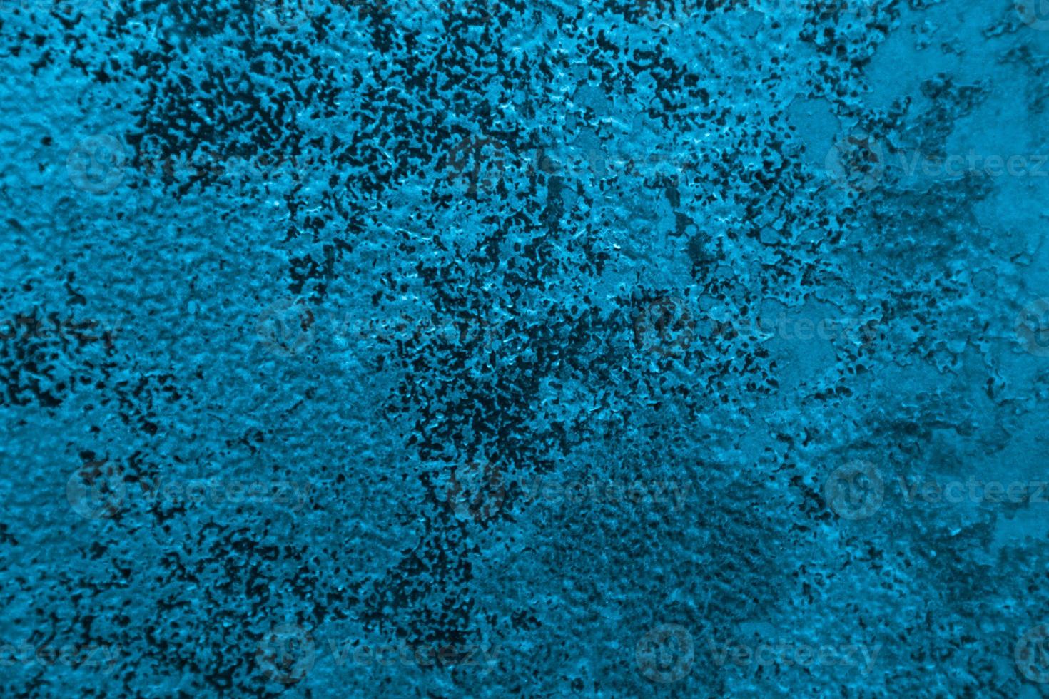 muro di metallo blu arrugginito foto
