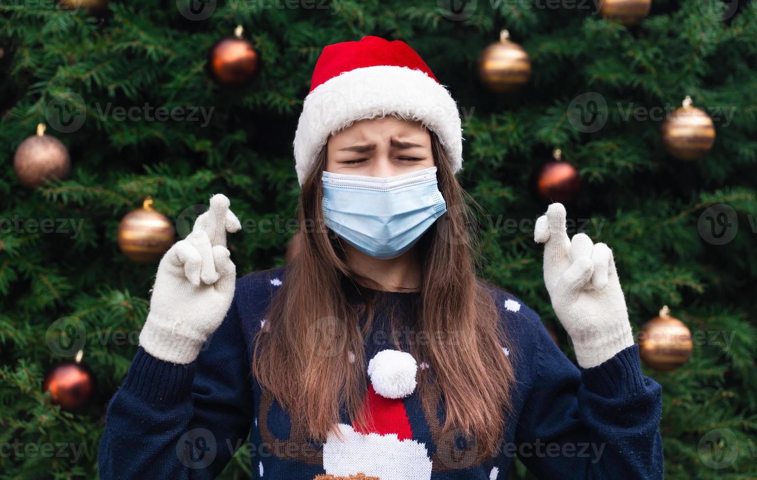 tenendo le dita incrociate per buona fortuna a Natale foto