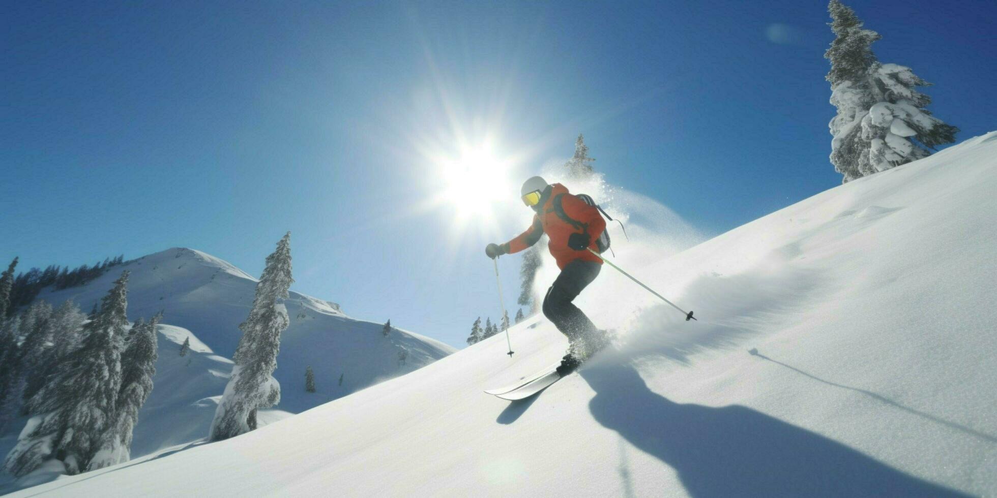 un' sciatore è andando giù su un' nevoso montagna foto