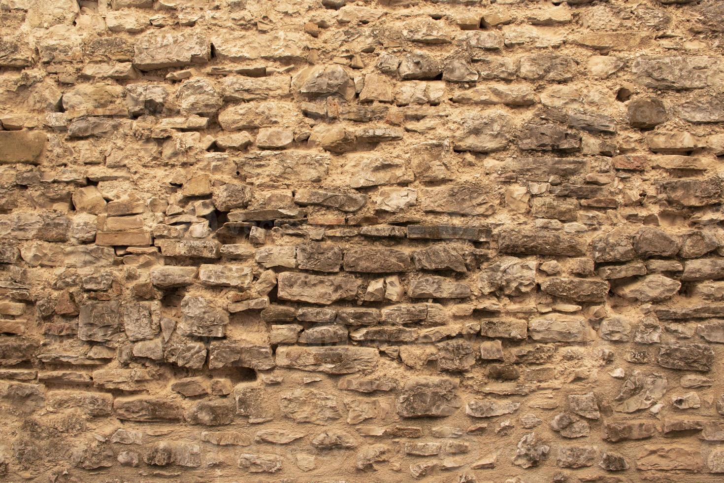 vecchio muro di pietra foto