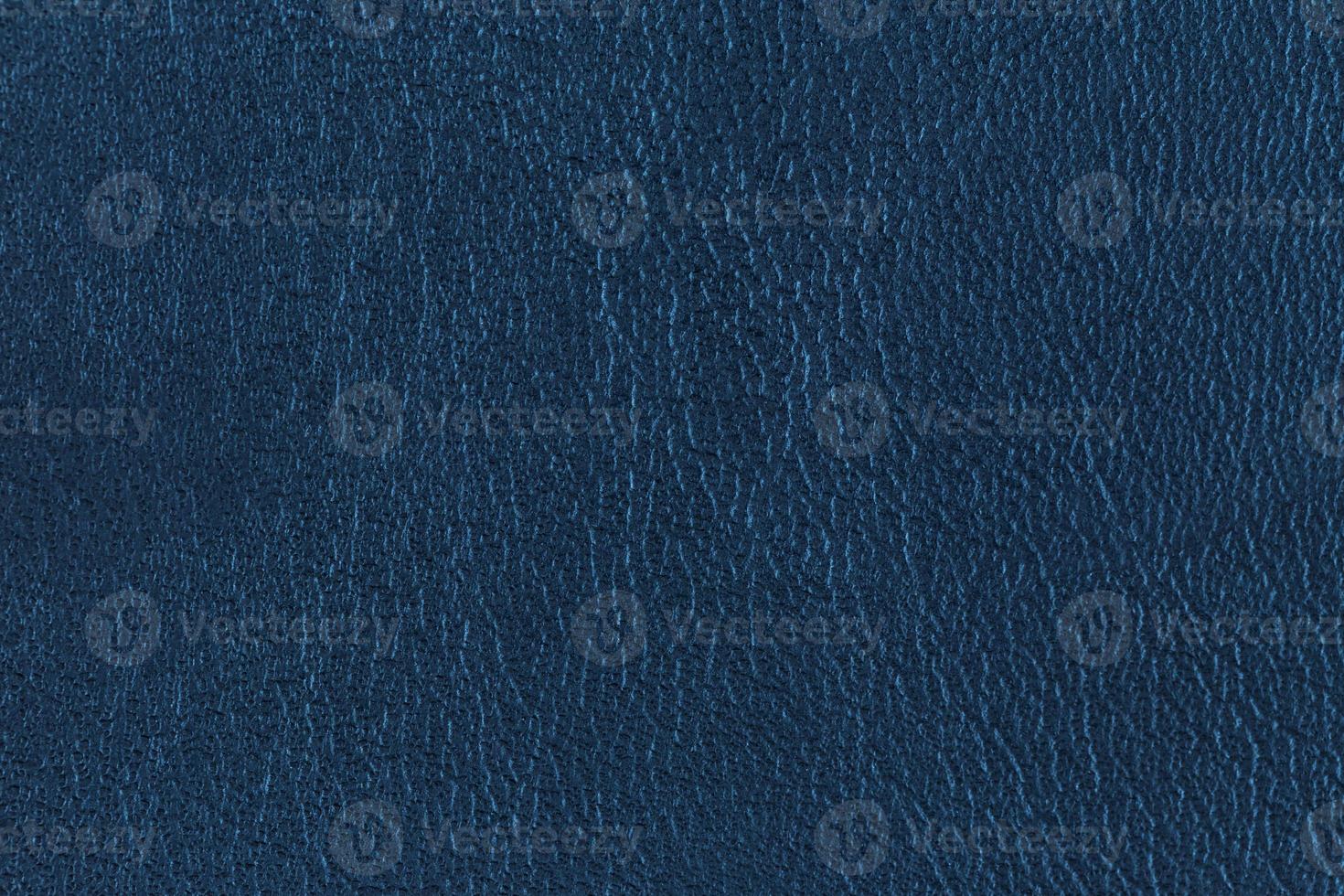 primo piano della superficie del fondo di struttura di cuoio blu scuro foto