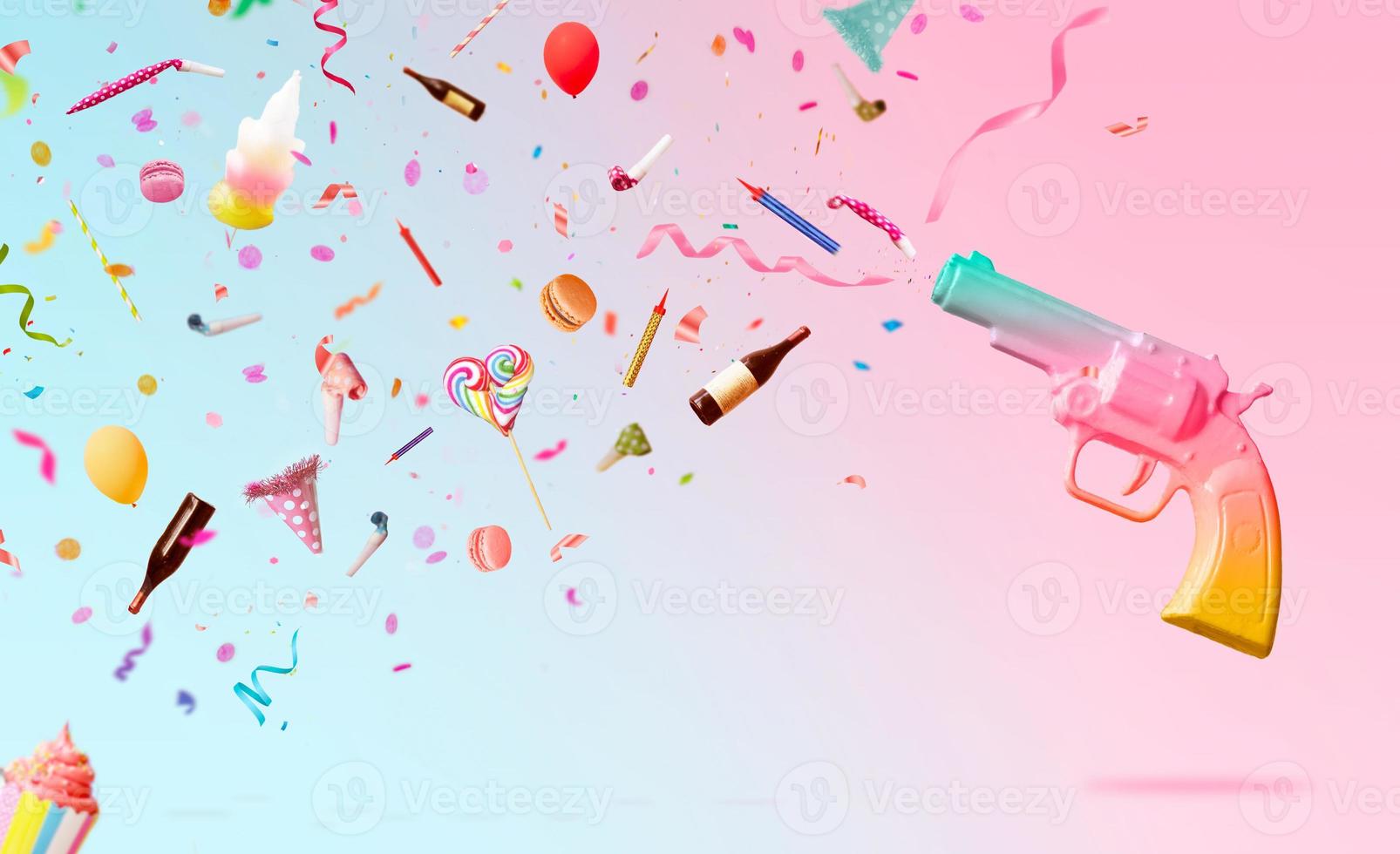 sfondo festa con pistola colorata che spara coriandoli stelle filanti candele e decorazioni su sfondo rosa sfondo festa creativa con spazio di copia foto