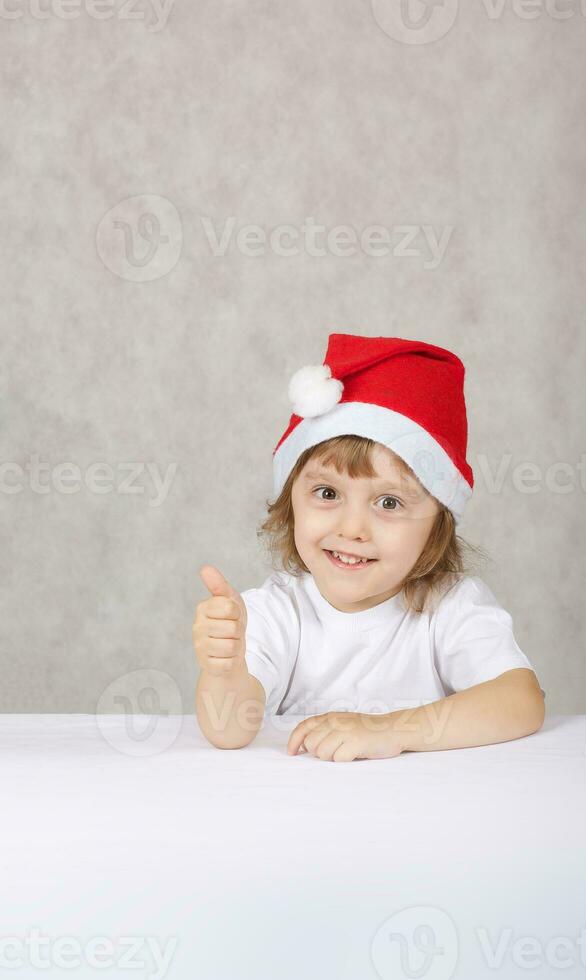 ragazzo nel Babbo Natale cappello foto