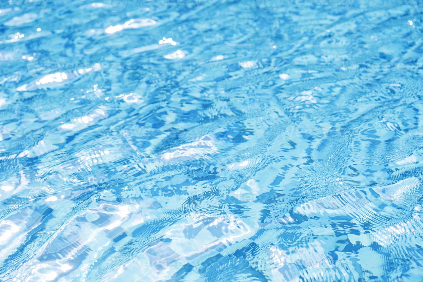 acqua nella priorità bassa di struttura della piscina foto