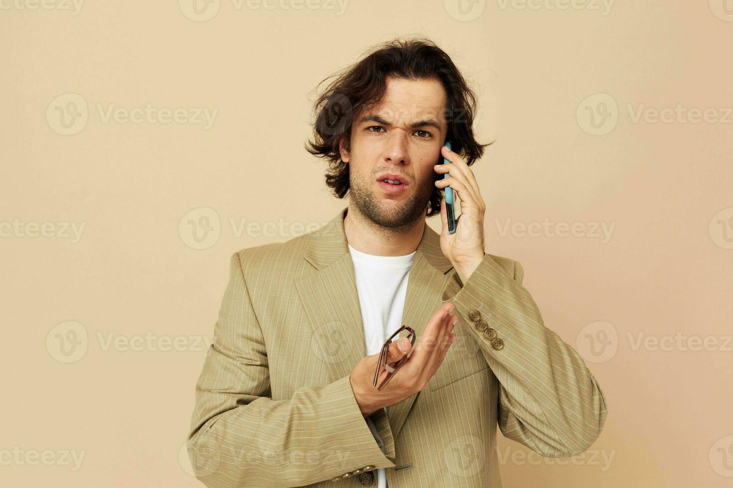 allegro uomo comunicazione di Telefono beige completo da uomo elegante stile stile di vita inalterato foto