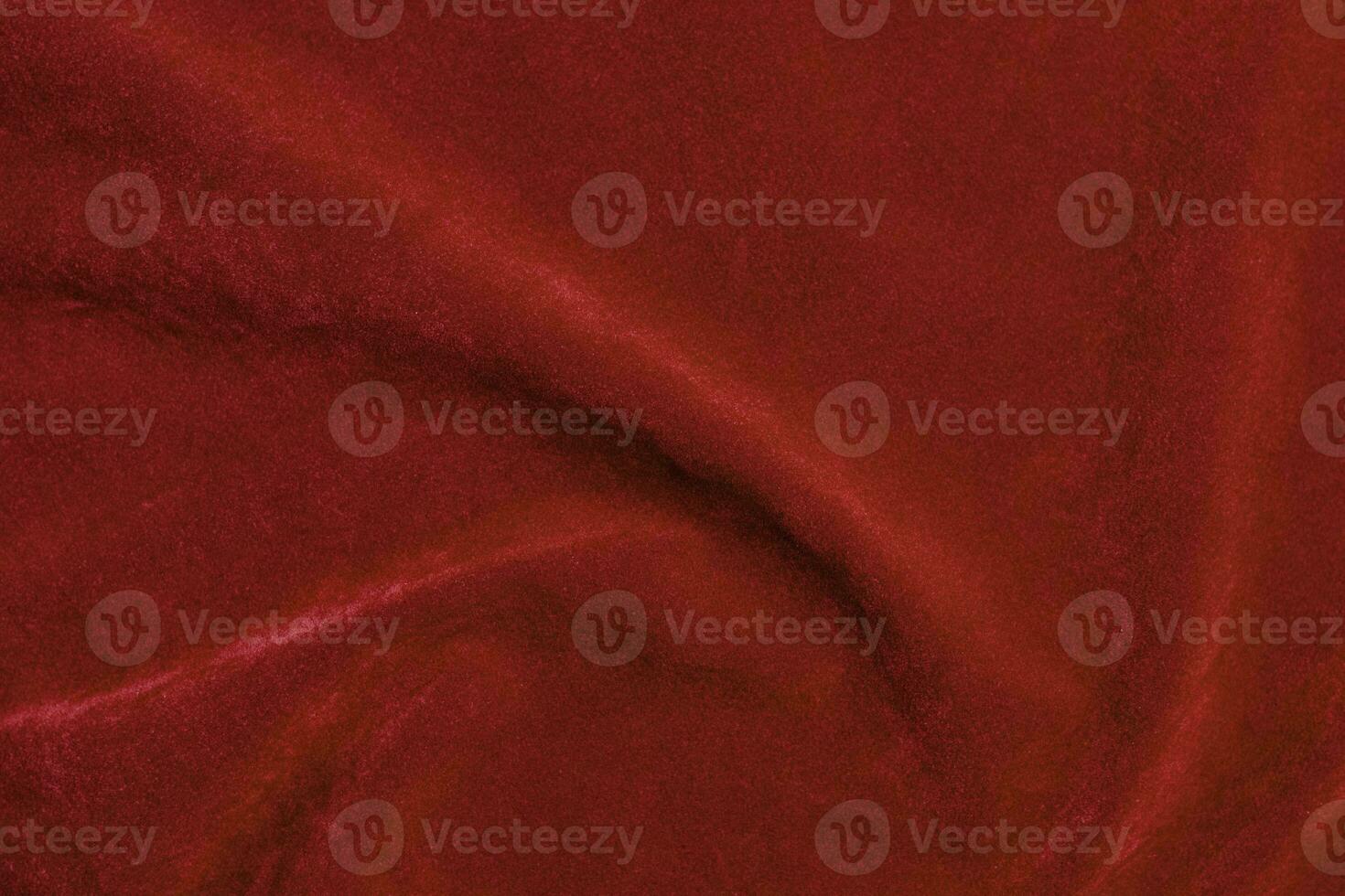 rosso velluto tessuto struttura Usato come sfondo. rosso tessuto sfondo di morbido e liscio tessile Materiale. Là è spazio per testo. foto
