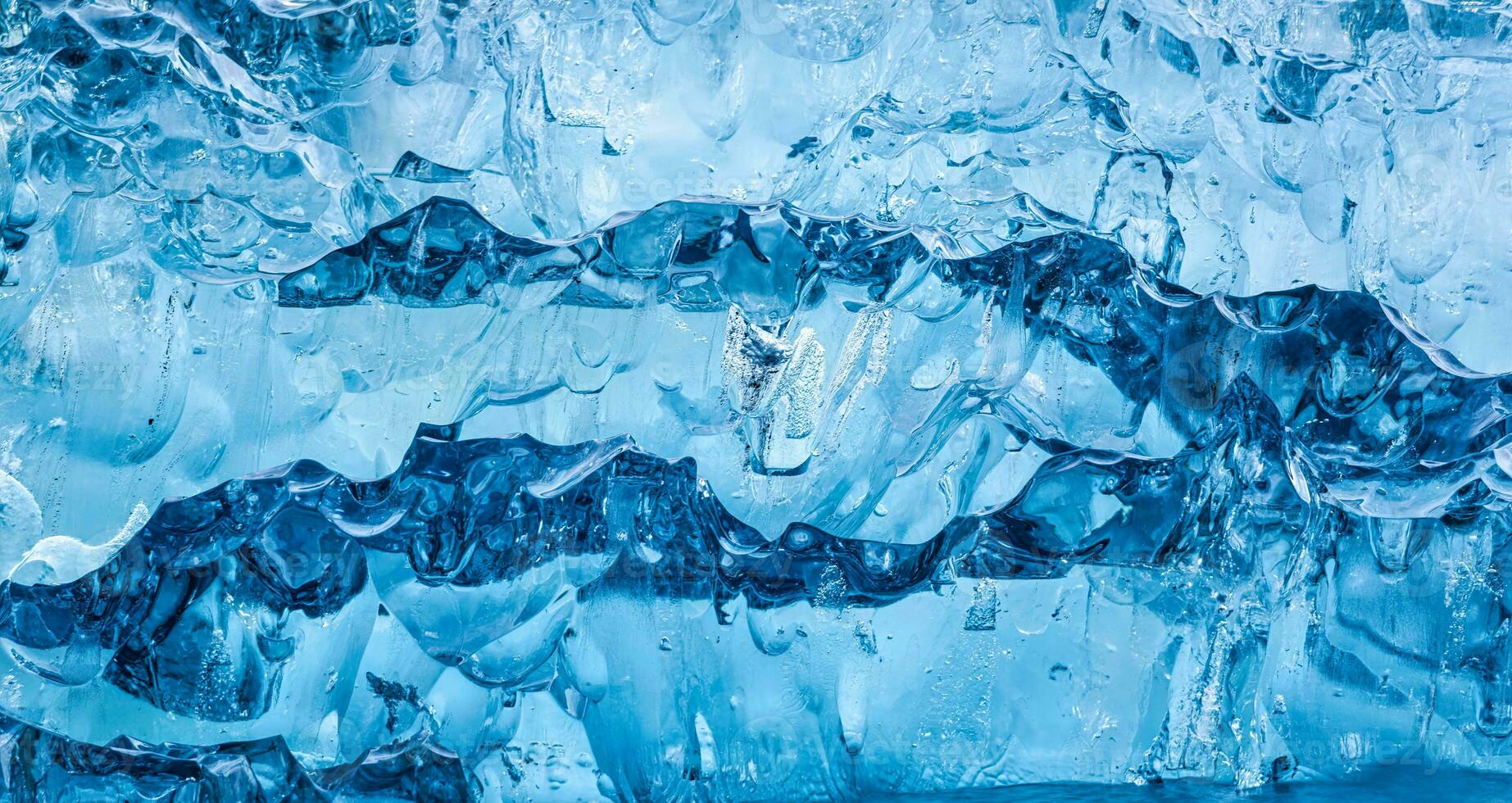 astratto blu ghiaccio crepe a partire dal iceberg foto