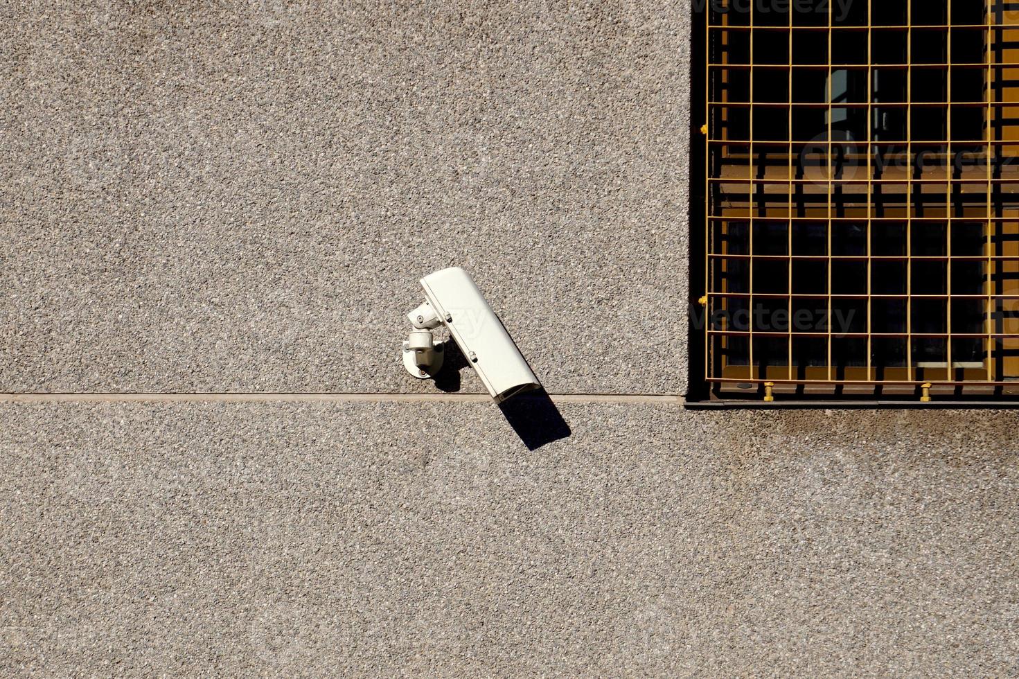 telecamera di sicurezza sul muro foto