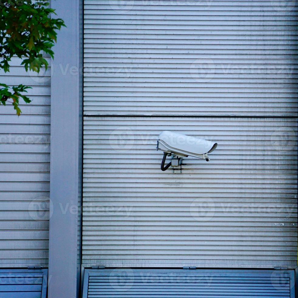 telecamera di sicurezza sul muro foto
