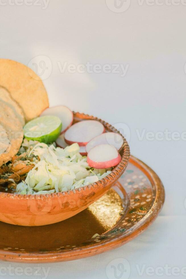 nel Messico, il vivace rosso Pozole è un' delizioso tradizionale comfort cibo foto