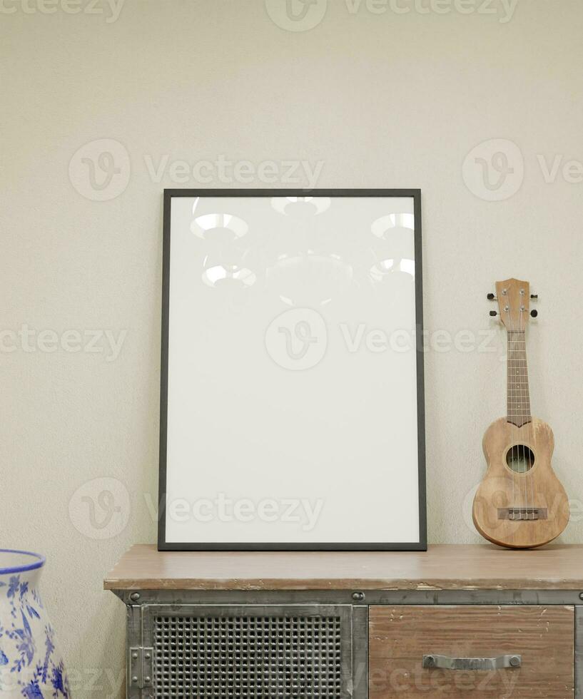 classico elegante riflessa ritratto telaio modello manifesto su il vecchio di legno tavolo con ukulele e bellissimo vaso decorazione e beige parete foto