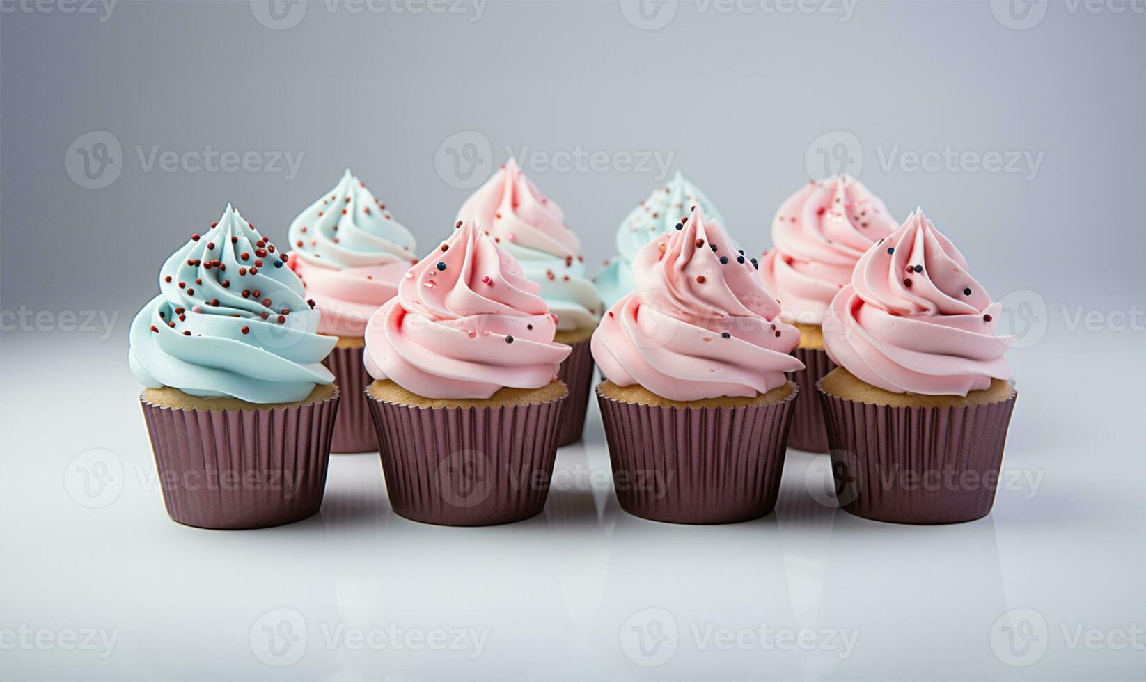 cupcakes con blu e rosa decorazione su bianca sfondo, vicino su Visualizza. ai generato foto