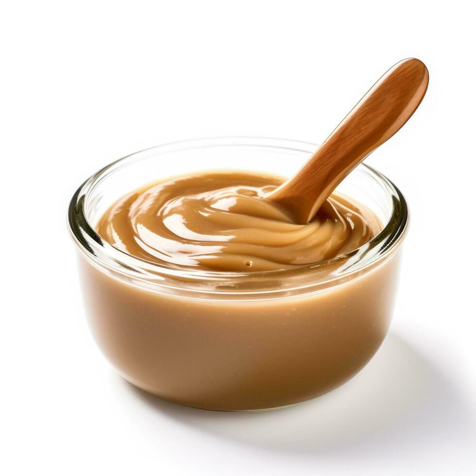 delizioso dulce de leche isolato su bianca sfondo foto