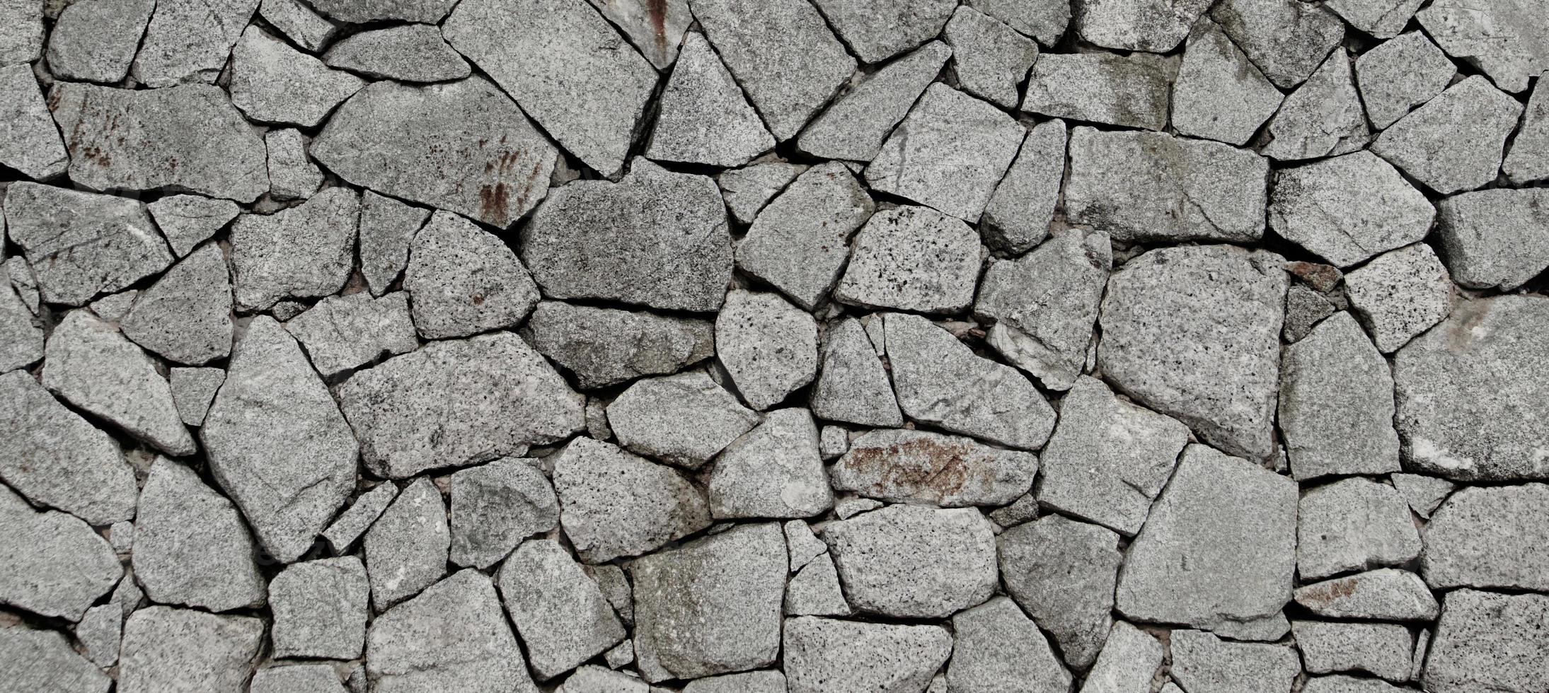 lo sfondo del modello di struttura del muro di pietra. foto