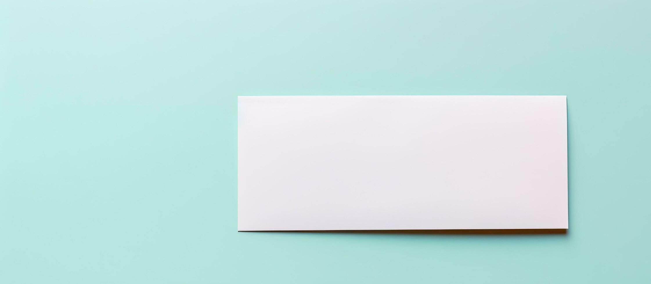foto di un' vuoto bianca carta contro un' vivace blu sfondo, fornire ampio copia spazio per testo o design elementi con copia spazio