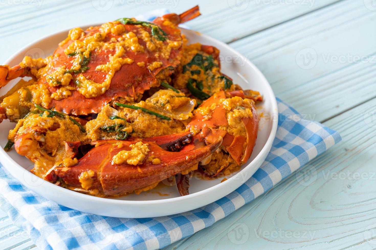 granchio saltato in padella con curry in polvere foto