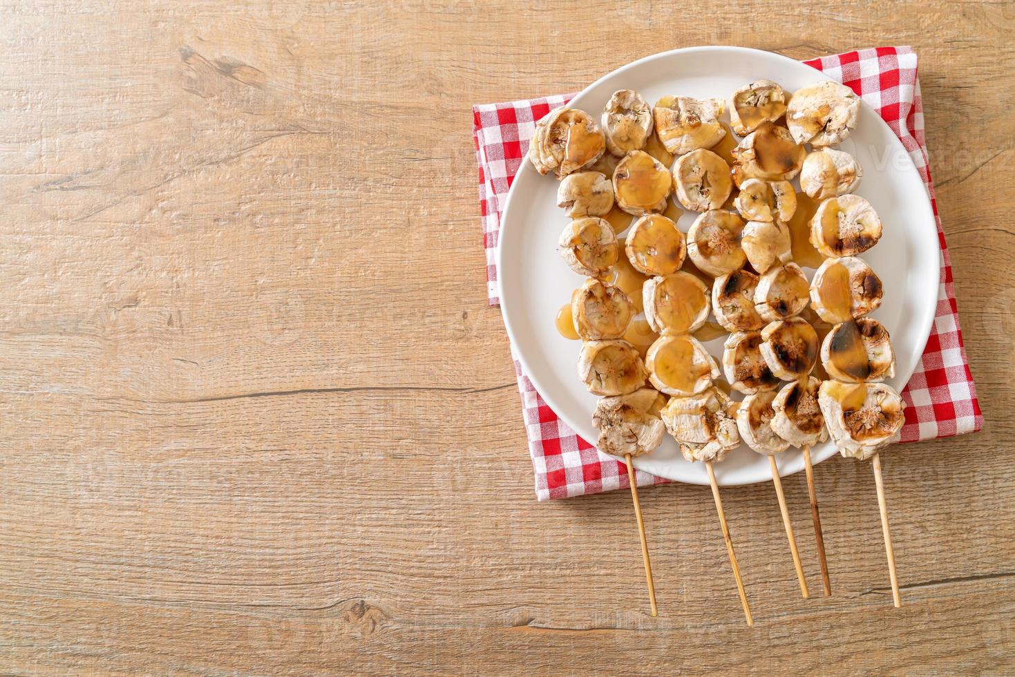 grigliate di banana con salsa al caramello foto