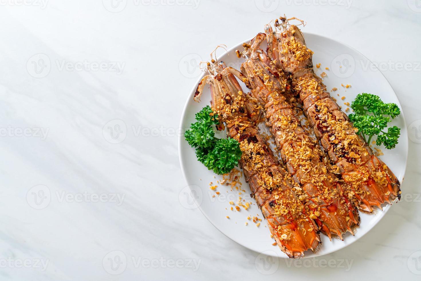 canocchie fritte con aglio foto