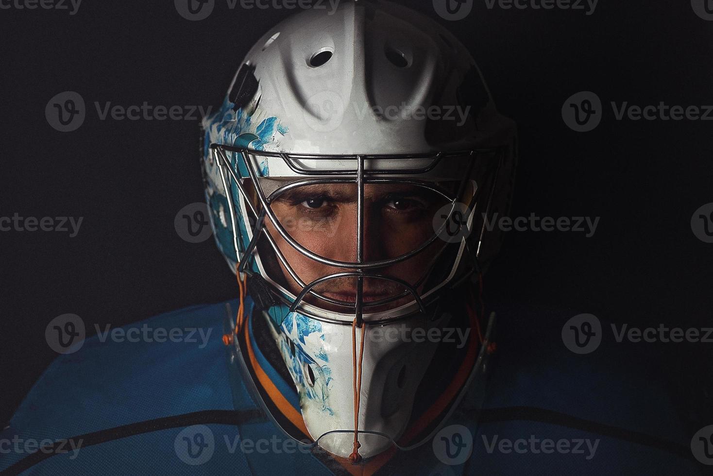 portiere di hockey con la maschera foto