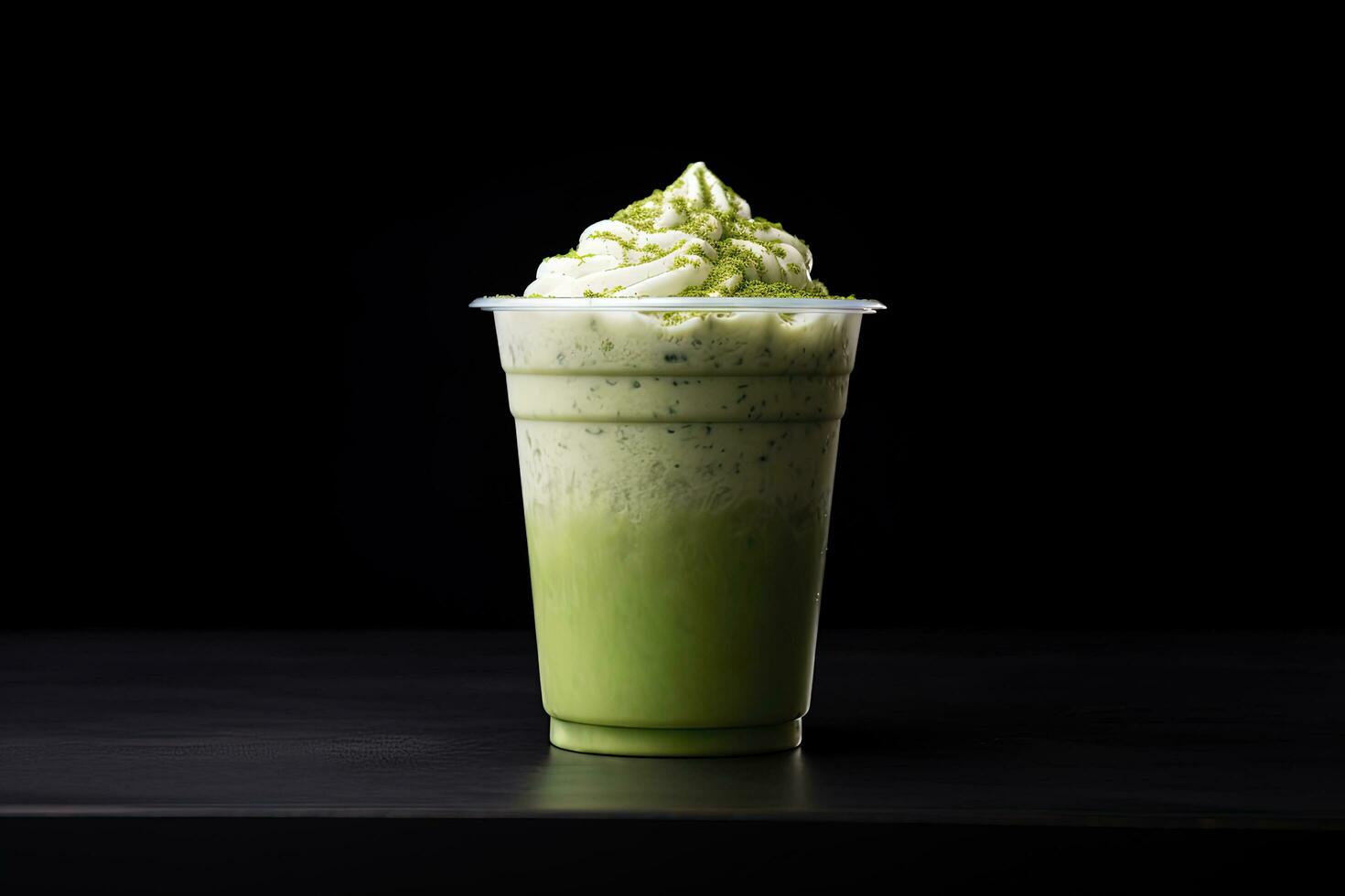 verde tè frappucino con frustato crema nel un' porta via tazza isolato su buio sfondo. ai generato foto