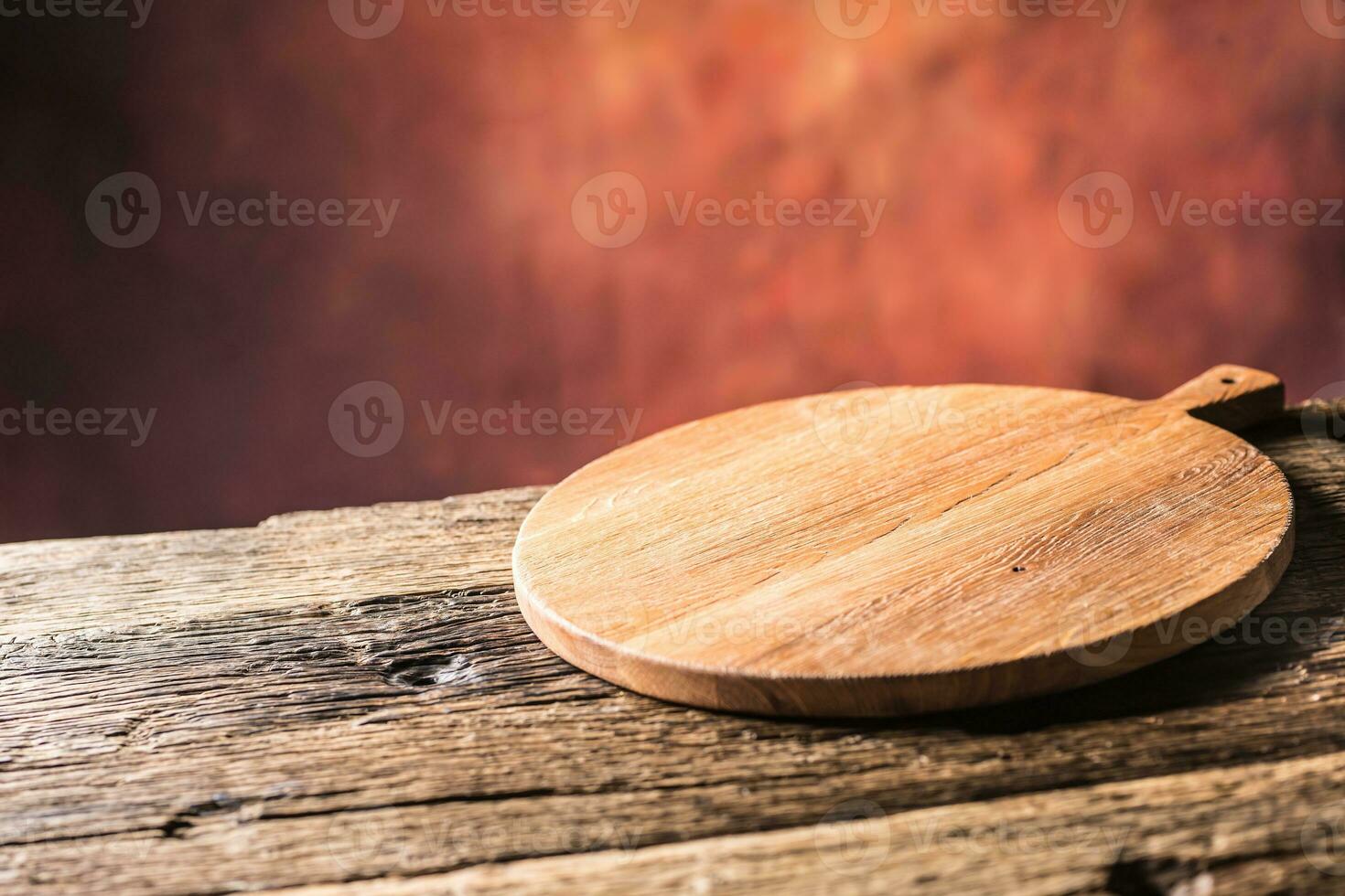 vuoto Pizza il giro tavola vecchio di legno tavolo e colore sfocato sfondo foto