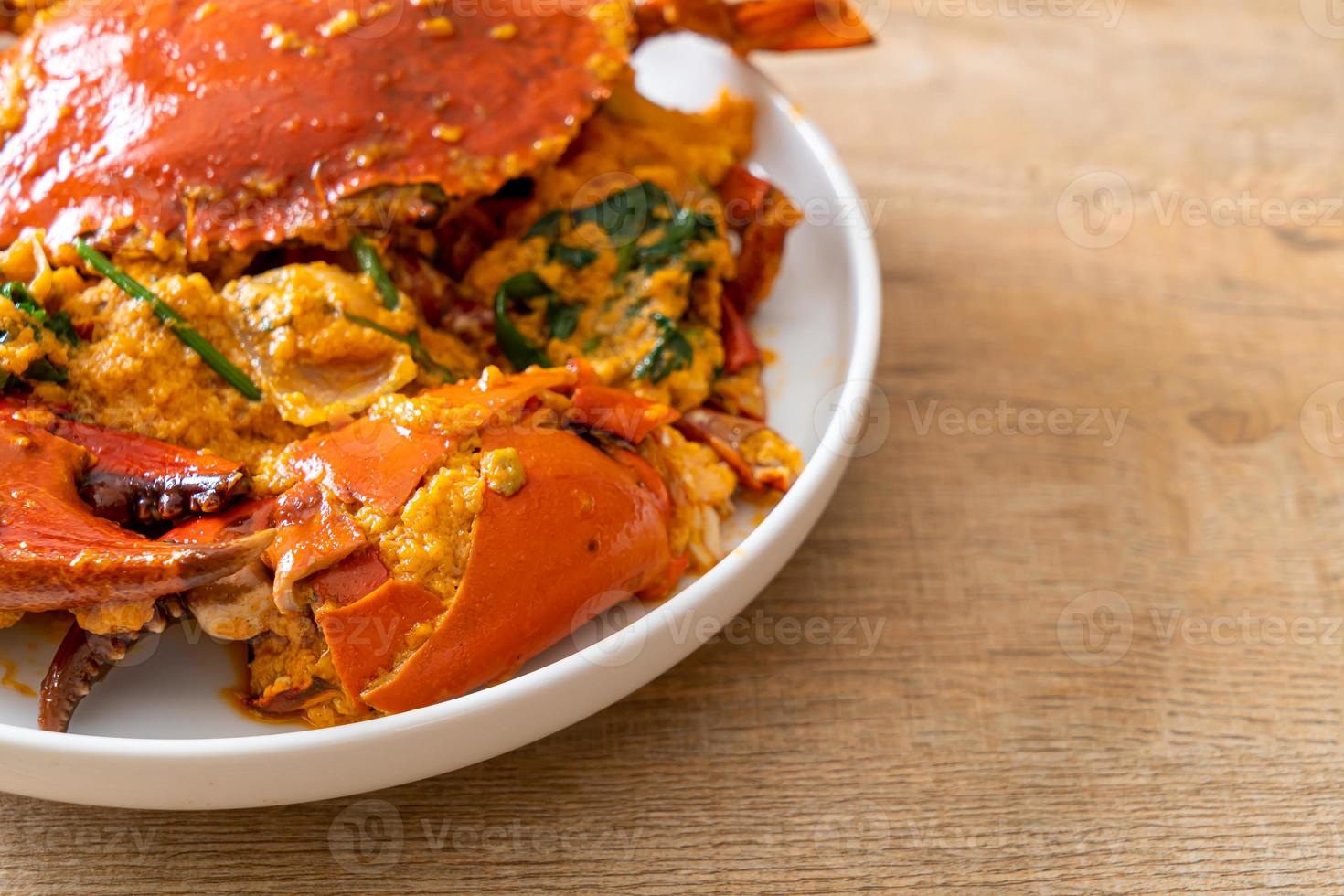 granchio saltato in padella con curry in polvere foto