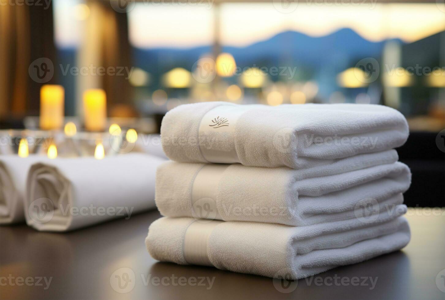 pila di pulito asciugamani su tavolo contro sfocato festivo luci, avvicinamento ai generato foto