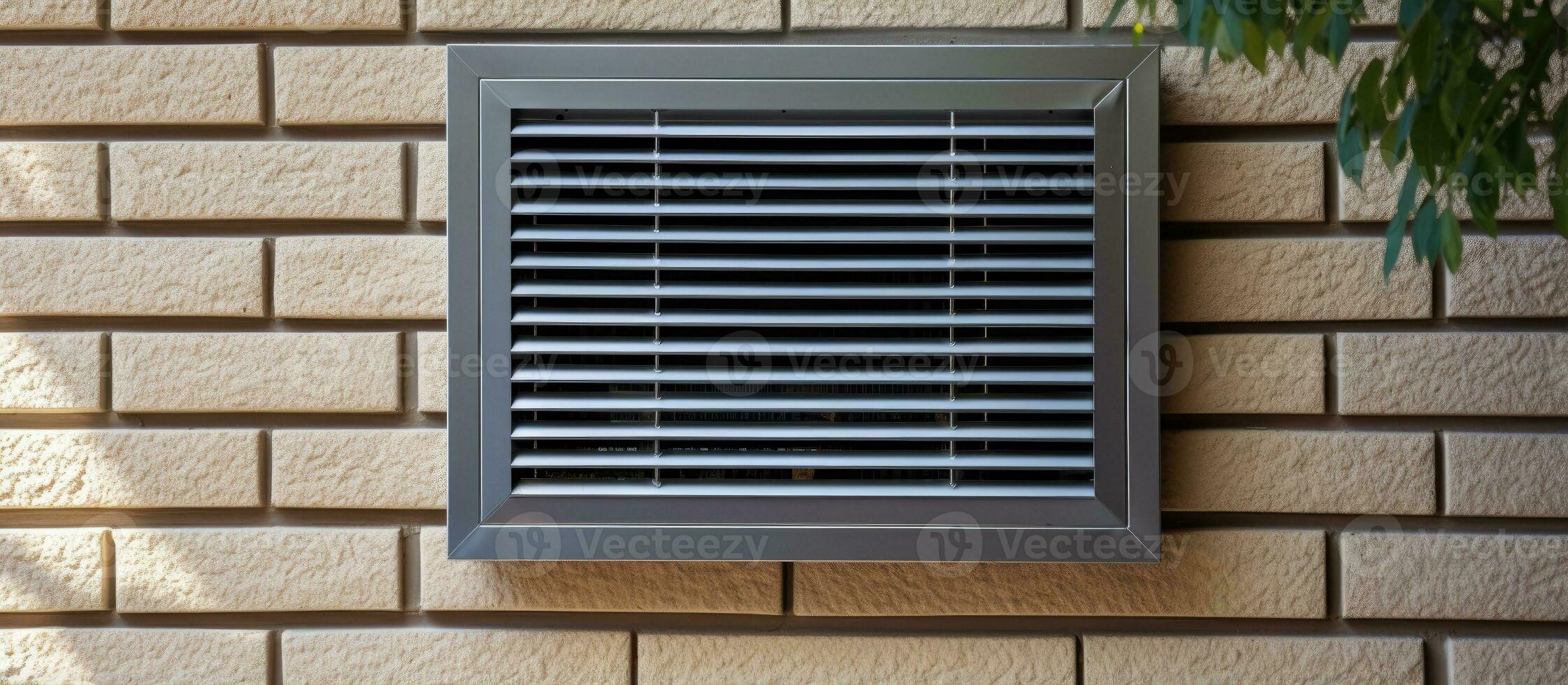 meccanico ventilazione con calore recupero nel un' Casa utilizzando metallo maglia assicurato aria presa e scarico nel il parete foto
