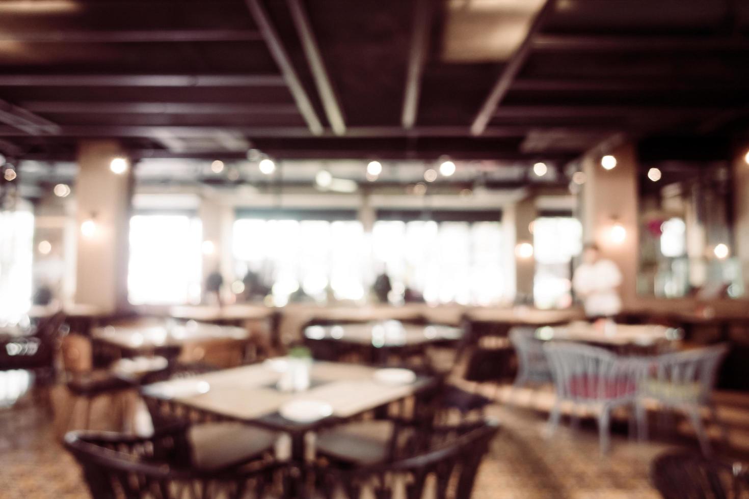 sfocatura astratta e interni sfocati della caffetteria e del ristorante foto