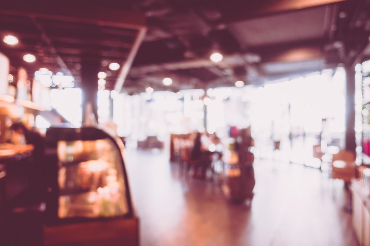 sfocatura astratta e interno del caffè della caffetteria per lo sfondo foto