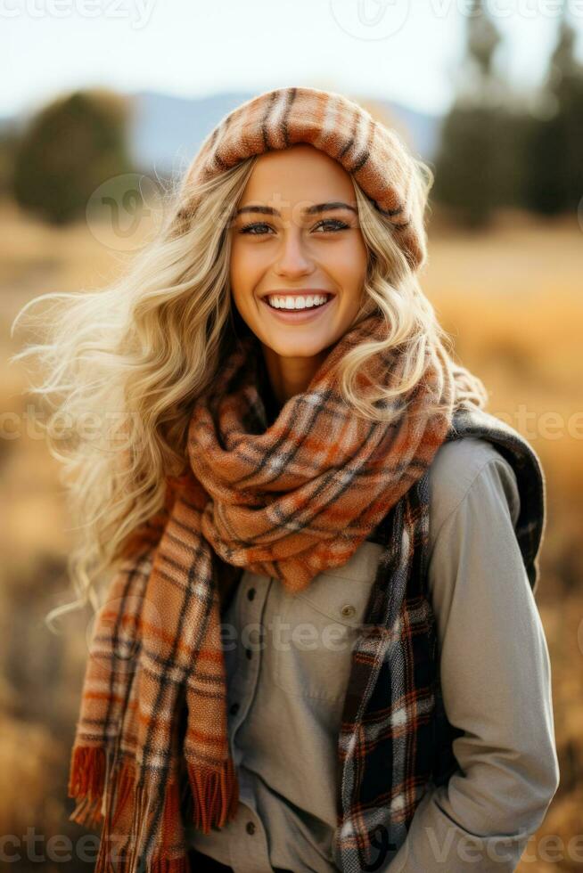 un' accogliente plaid sciarpa avvolto in giro un' sorridente modello cattura il calore e stile di autunno moda foto