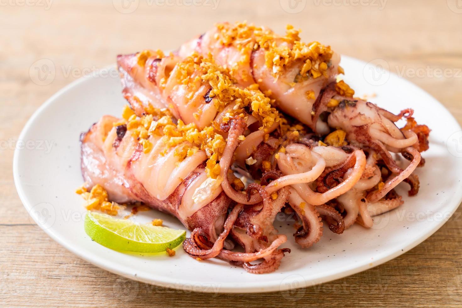 calamari fritti con aglio - stile di mare foto