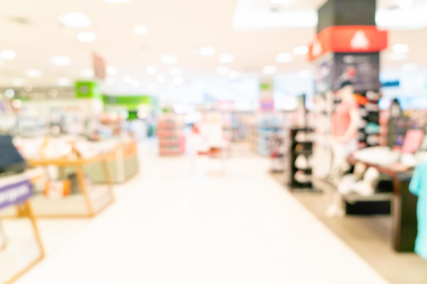 negozio di sfocatura astratta e negozio al dettaglio nel centro commerciale per lo sfondo foto