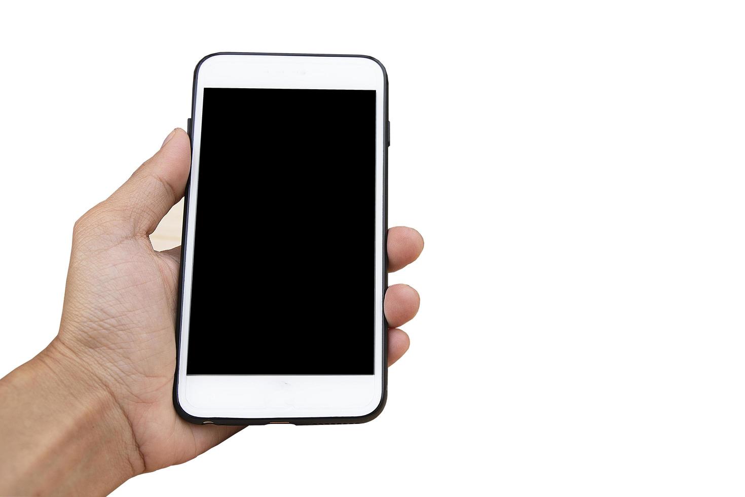 mano che tiene lo smartphone mobile su sfondo bianco foto