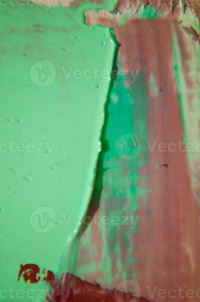 multicolore struttura la pittura. astratto arte sfondo. olio su tela. ruvido tratti di pennello di dipingere. avvicinamento di un' pittura di olio e tavolozza coltello. altamente strutturato, alto qualità particolari. foto