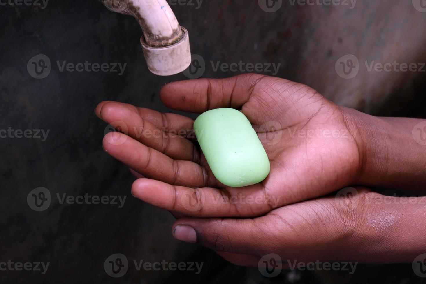 sapone a portata di mano per il lavaggio foto