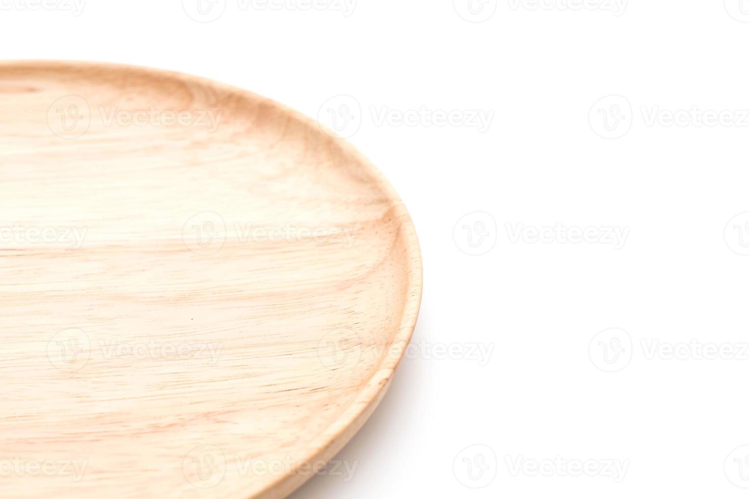 piastra di legno su sfondo bianco foto