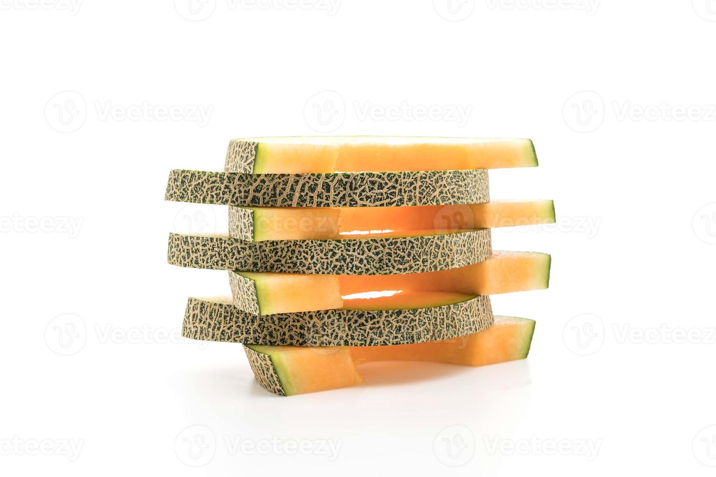 melone cantalupo su sfondo bianco foto