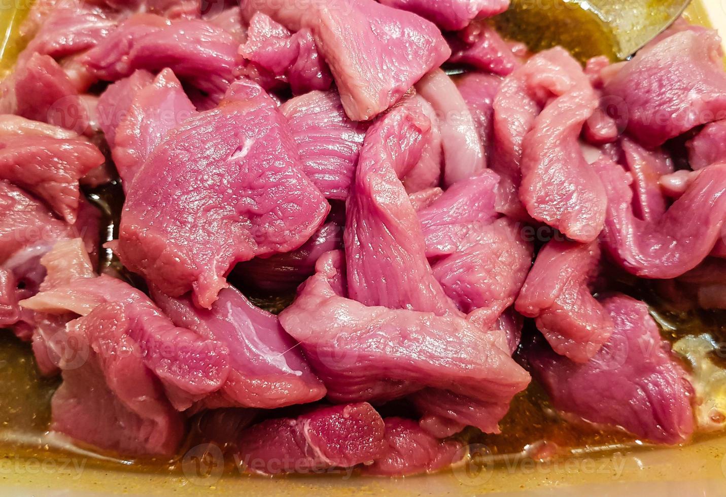 carne per preparare il tradizionale curry asiatico foto